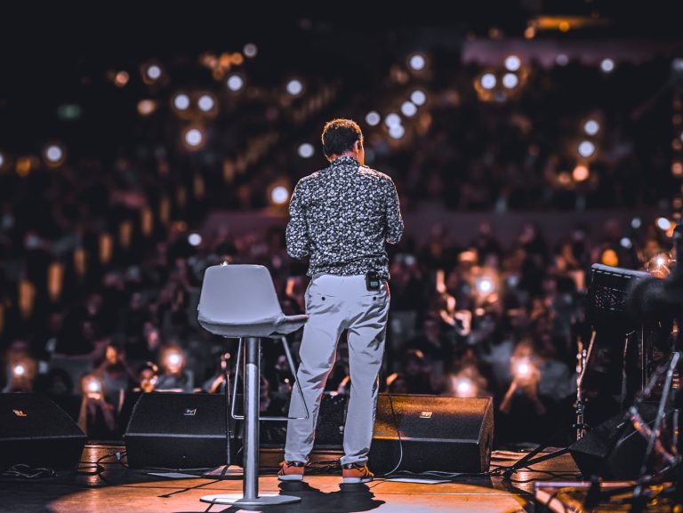 Speaker on stage at a corporate conference