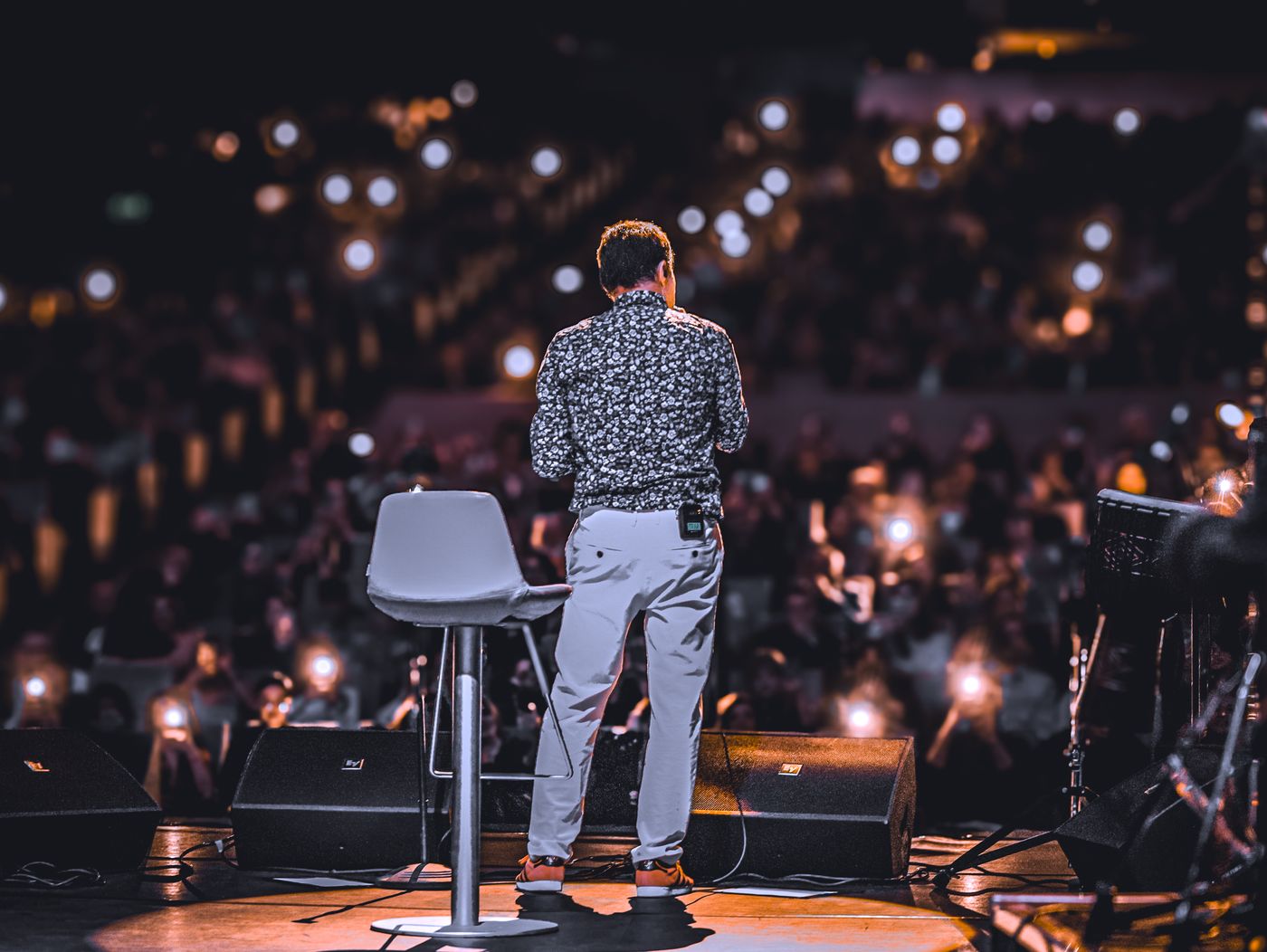 Speaker on stage at a corporate conference
