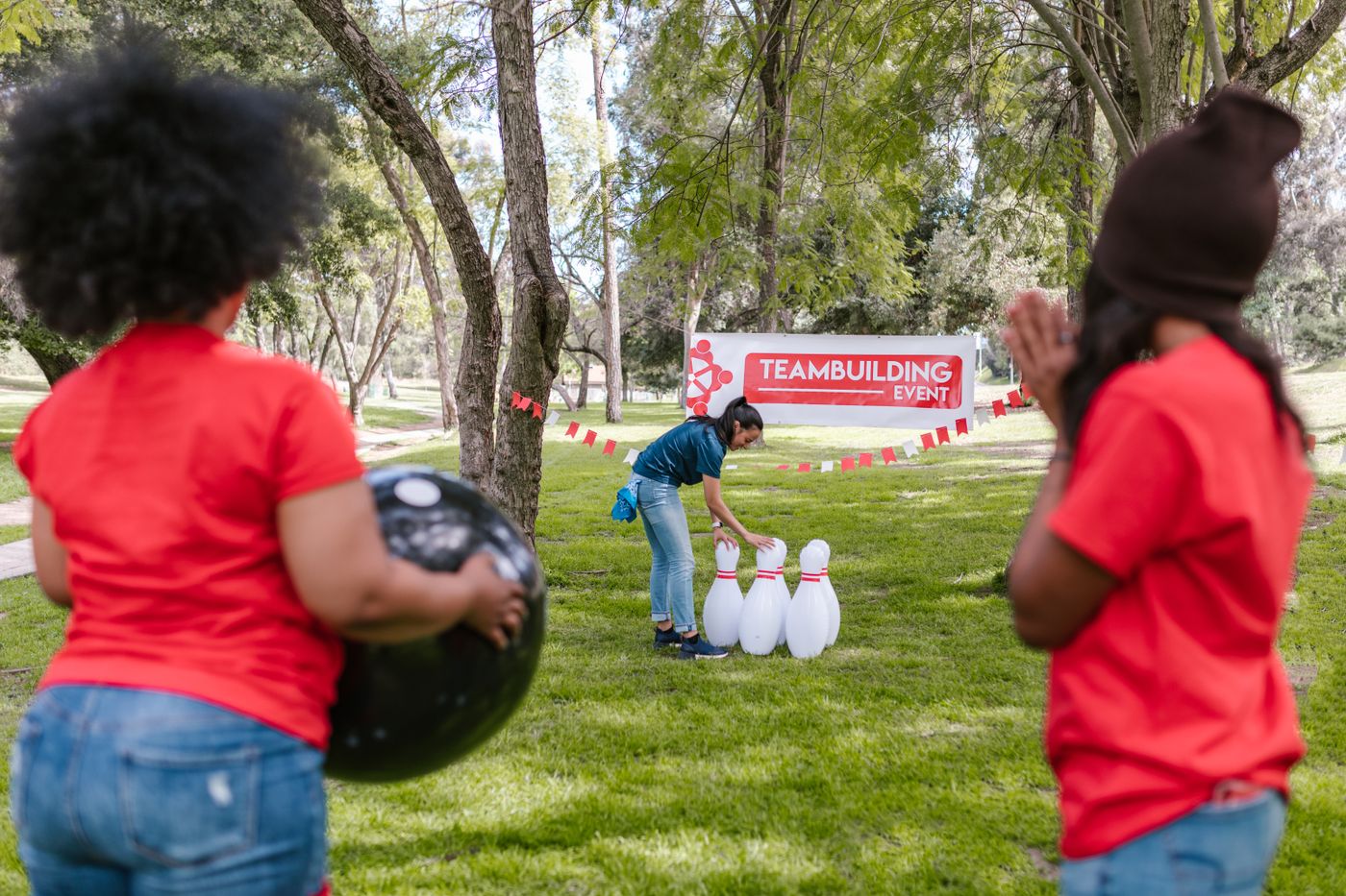 Colleagues playing an outdoor team game