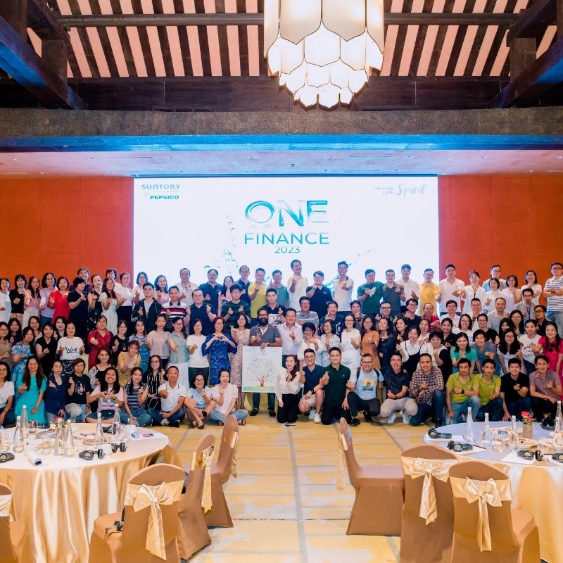 Annual meeting group in a hotel ballroom